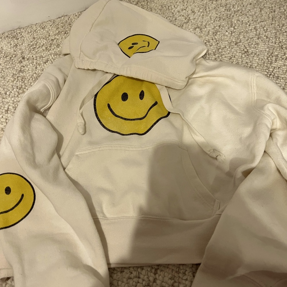 Smiley face sweat shirt